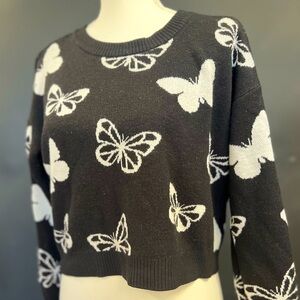 No Boundaries Woman’s Knit sweater black and white butterflies. Size M (7-9)